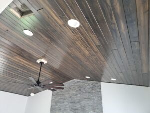 Synergy Wood ceiling installation by CFL Custom Carpentry, showcasing a rich wood finish with precise craftsmanship