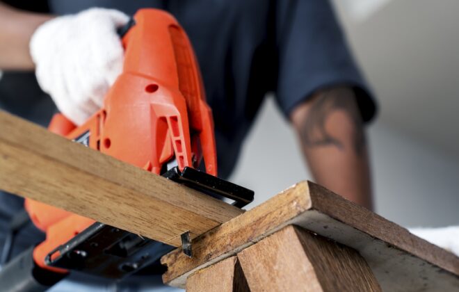 Carpenter crafting a wooden masterpiece.